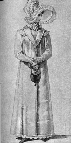 798. «Винер Моден», 1819г. Женщина в рединготе с большим чепцом, украшенным оборками, держит в руке небольшую продолговатую сумочку. 