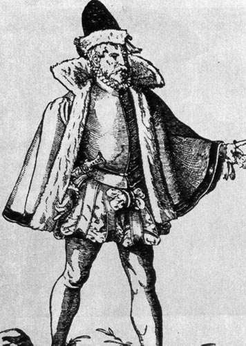 939. Нюрнбергский купец, 1577 г. Испанский плащ в том виде, в котором он вошел в историю одежды, — короткий, с меховой подкладкой и поднятым воротником. Он носится с короткими брюками на подкладке и цилиндровидной шапкой. 