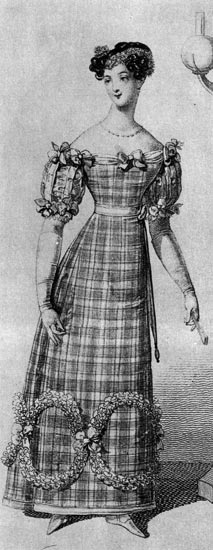 411. «Винер Моден» (WienerModen), 1822г. Клетка тогда была очень популярна. Вечернее платье богато украшено лентами и искусственными цветами, образующими соединенные круги по нижнему краю юбки. 