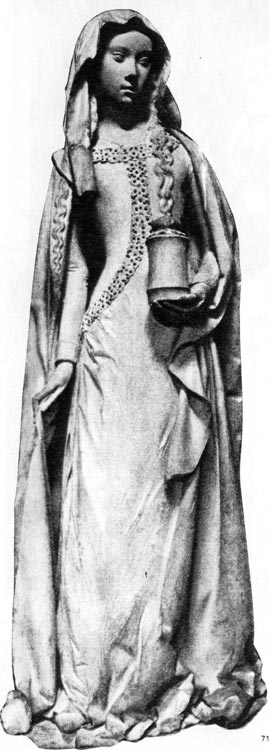 715. Статуя Марии Магдалины. Нотр-Дам, Монлюсон, XIII-XV вв. Готическое платье с узкими Длинными рукавами, большей частью без украшений. Плащ-накидка, дополняющая костюм, переходит в капюшон. 