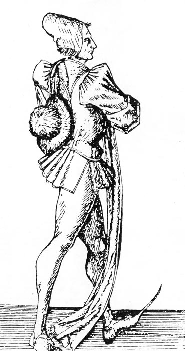 863. Рисунок на игральной карте XV века. Дэнди эпохи Ренессанса: одежда очень облегающая, только плечи и рукава искусственно расширены (mahottres). В этой причудливой моде мысы башмаков зачастую были длиннее, чем сами башмаки. 
